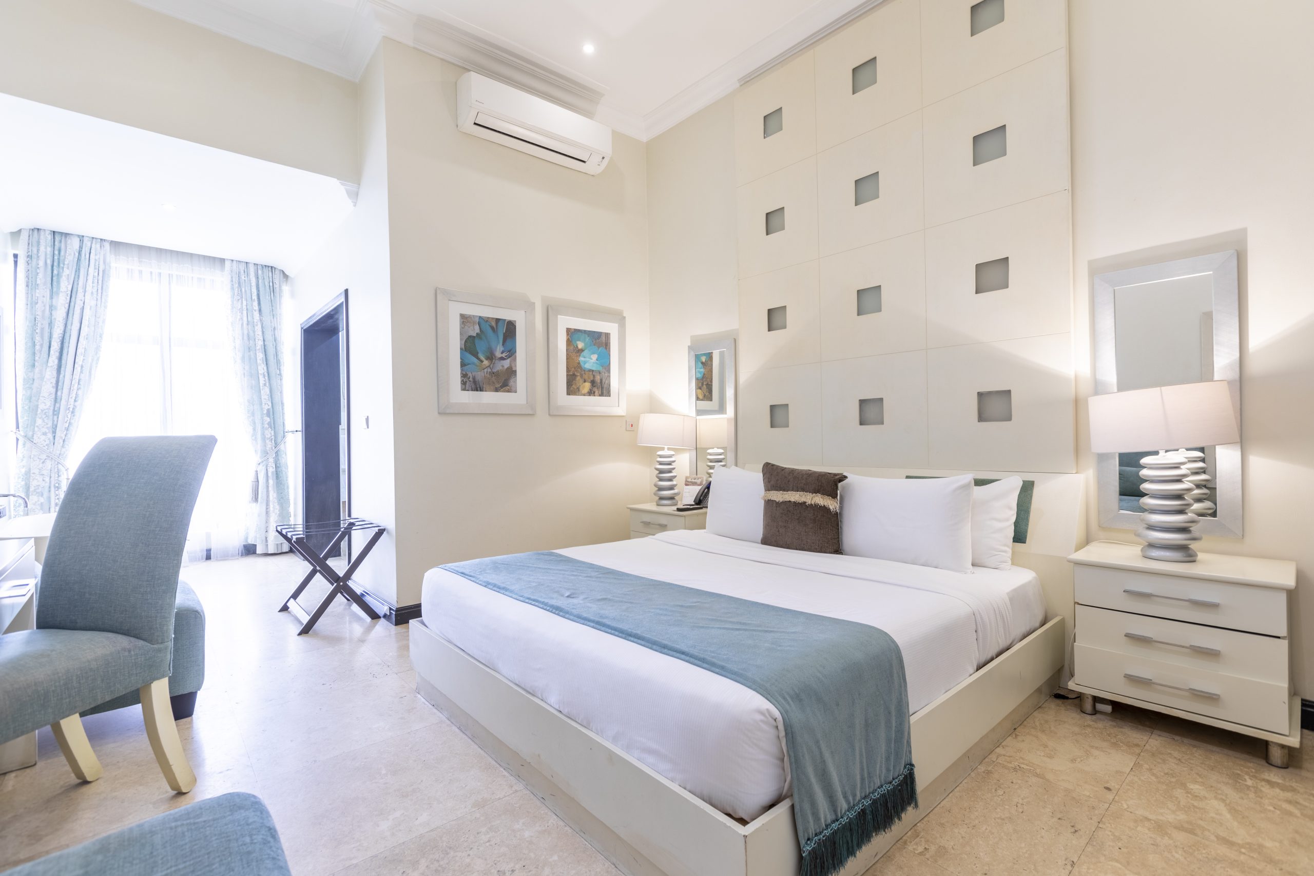 Aqua Verde Junior Suite showcasing modern furnishings, soft lighting, and elegant decor, creating a luxurious and inviting atmosphere.