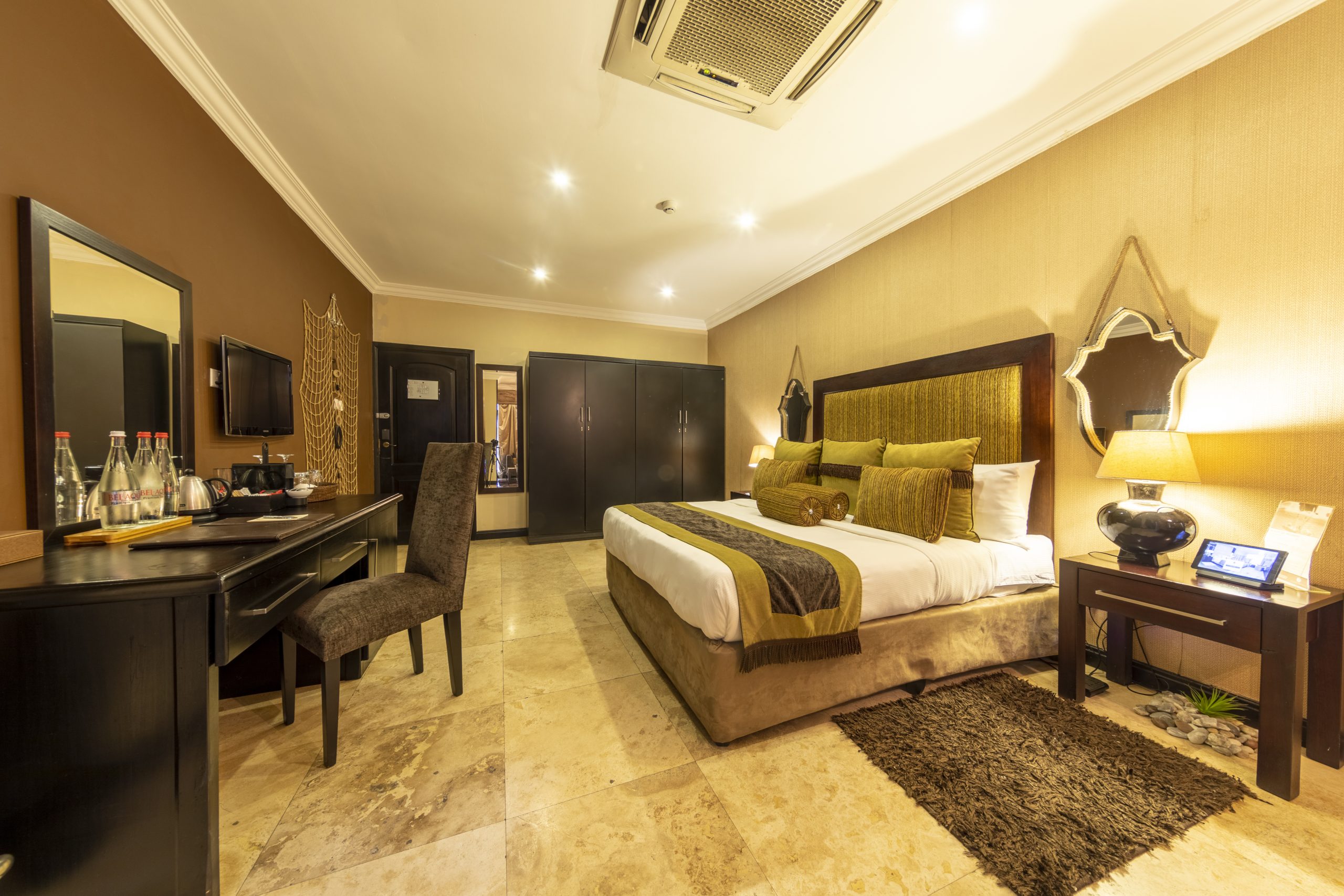 Elmina Junior Suite featuring elegant furnishings, soft lighting, and a cozy ambiance, designed to provide a comfortable and relaxing getaway.