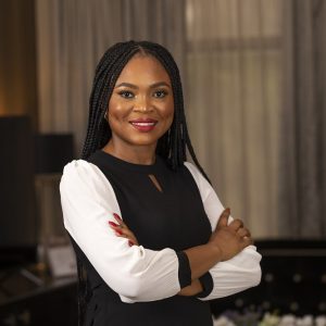 Portrait of Matilda at Villa Monti Cello, capturing a warm smile and inviting personality in an elegant setting.