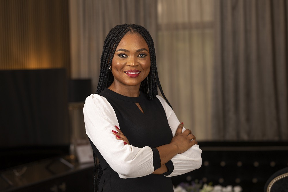 Portrait of Matilda at Villa Monti Cello, capturing a warm smile and inviting personality in an elegant setting.