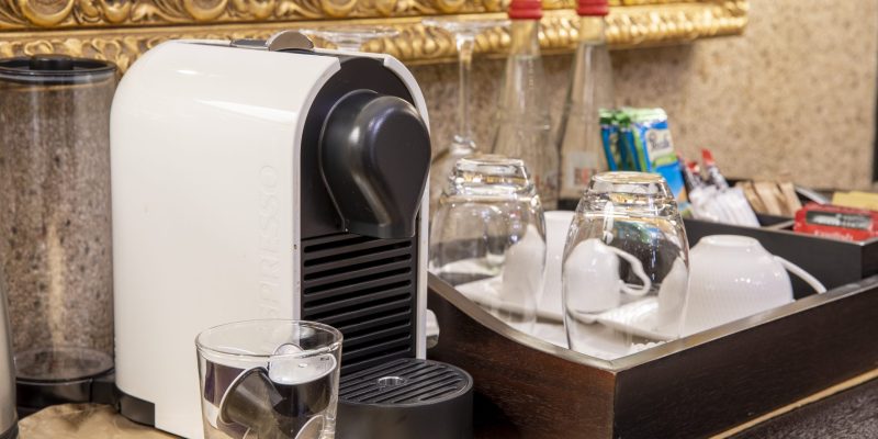 Kwame Nkrumah Presidential Suite coffee station with elegant design and premium coffee equipment.